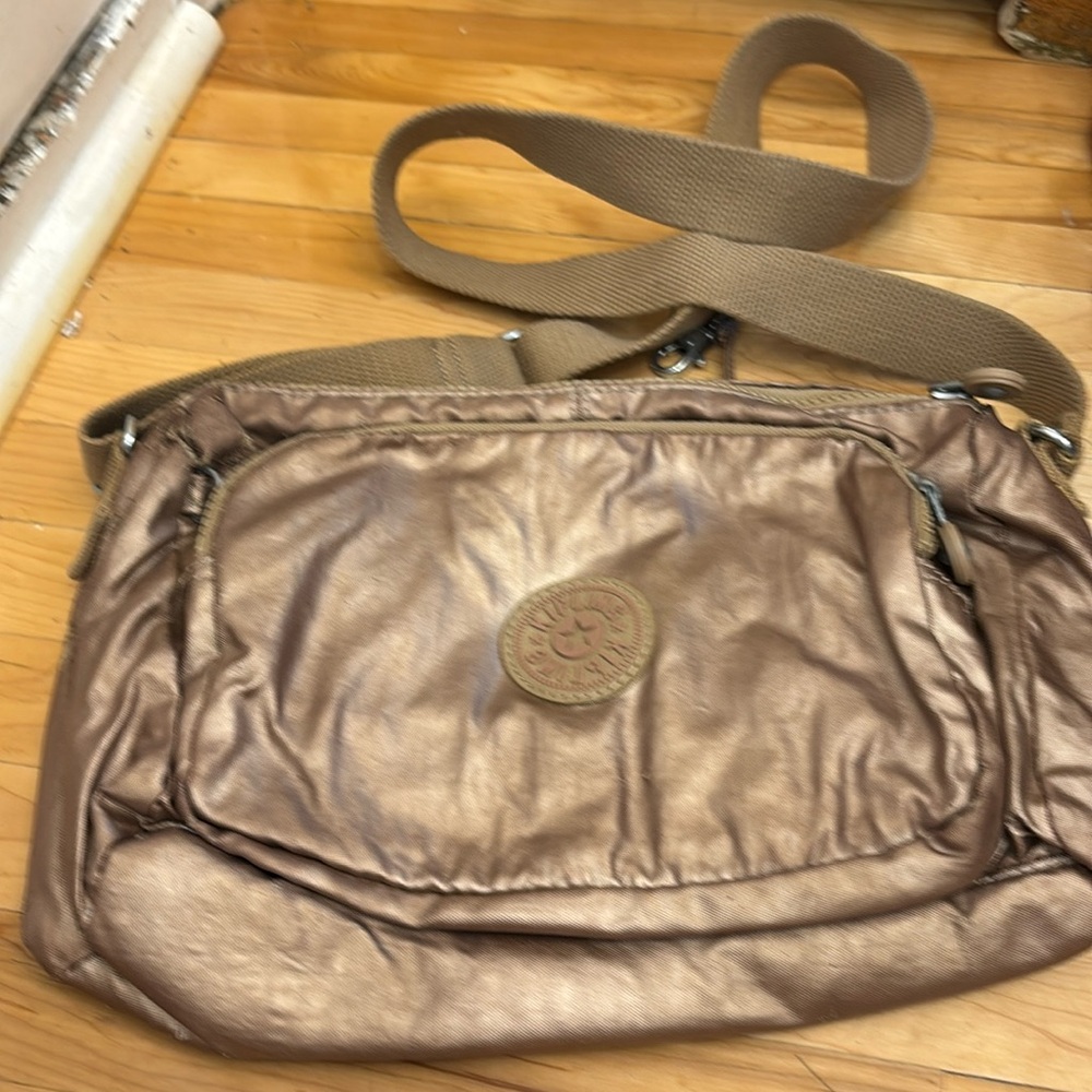 Kipling Gold Canvas Nice Condition